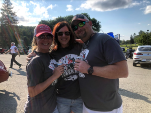 three attendees in poker run tshirts