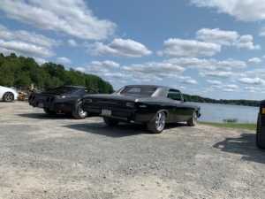 classic car overlooking jakes elk lake tavern's lake